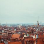 A picturesque view of Nürnberg's old town with Gothic architecture and urban skyline.