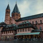 Scenic view of the Mainz Cathedral facade and adjacent town square in Germany, capturing its architectural charm.