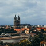 Aerial view of Magdeburg city and Cathedral, showcasing gothic architecture.