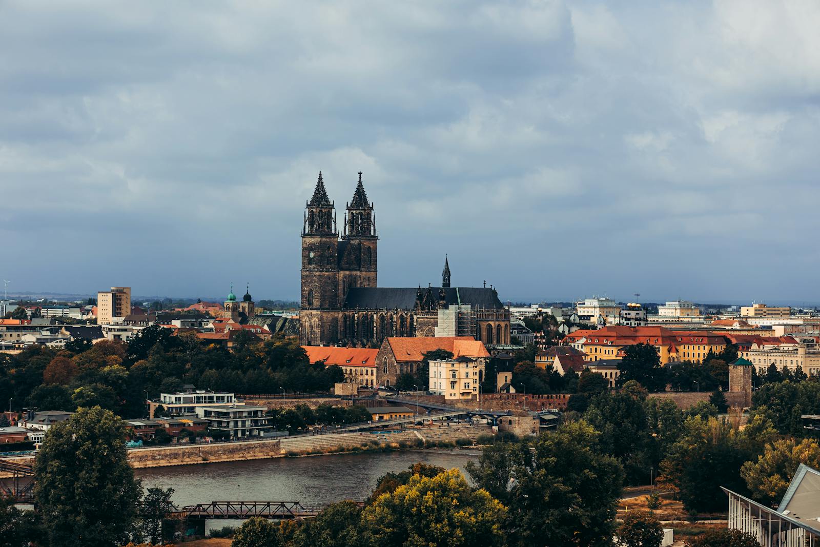 Aerial view of Magdeburg city and Cathedral, showcasing gothic architecture.